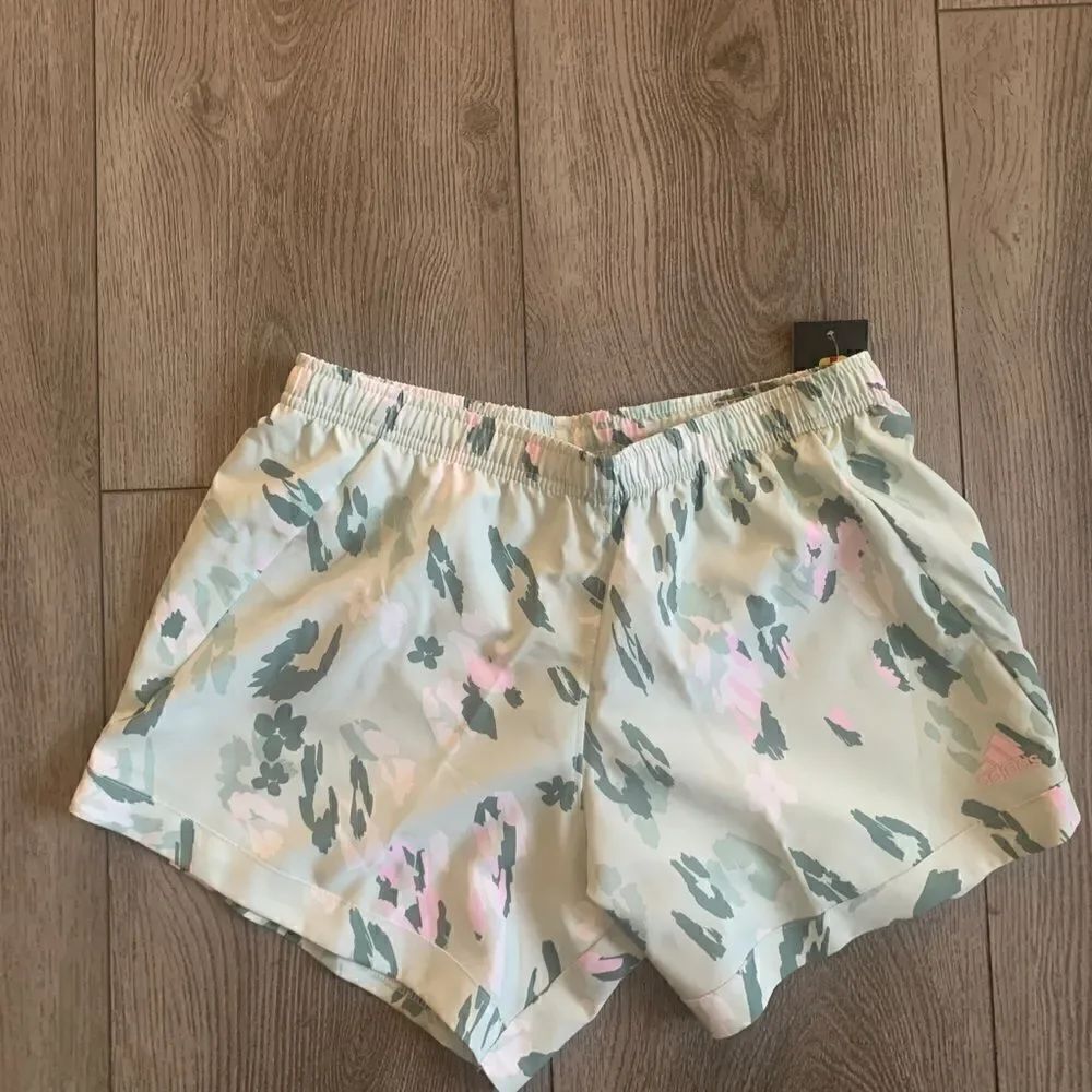 Adidas girls pink and green shorts. Perfect for any sport practice